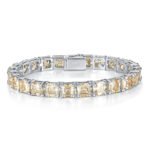 Tennis bracelet in sterling silver with pave set yellow zirconia.